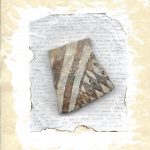 Photo of painted rock placed on notebook paper