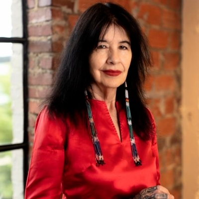 Joy Harjo in red shirt