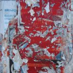Telephone pole flyers covered with red paint