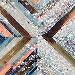 Abstract image of boards forming X