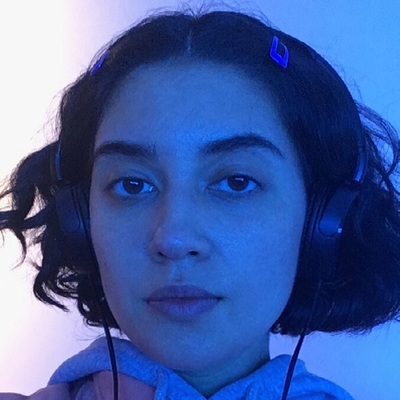 Ivanna Baranova wearing headphones