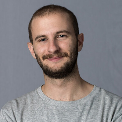 David Connor in gray shirt against gray background