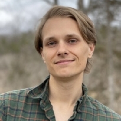 Gardiner Allen Brown standing outside