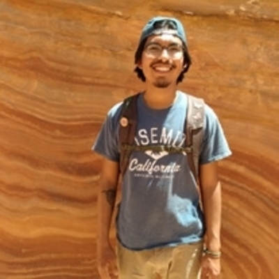 Marvin Contreras in front of red rock