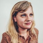 Tess Fahlgren in brown shirt