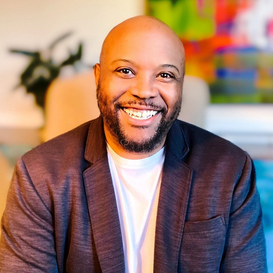 Smiling headshot of Idris Goodman.